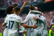 MADRID, SPAIN - FEBRUARY 18: Gareth Bale (R) of Real Madrid CF celebrates scoring their second goal with teammates during the La Liga match between Real Madrid CF and RCD Espanyol at Estadio Santiago Bernabeu on February 18, 2017 in Madrid, Spain.  (Photo by Gonzalo Arroyo Moreno/Getty Images)